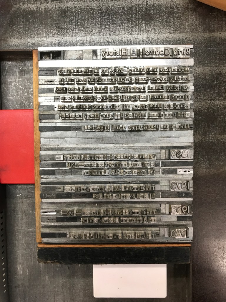 Photo of letterpress text block with small text