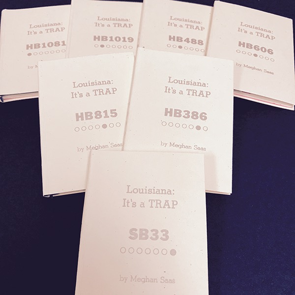 Photo of all seven book covers together on a table